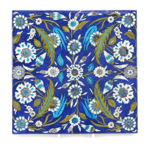 471 - Large Turkish Iznik pottery tile fragment hand painted with flowers, 28cm x 28cm