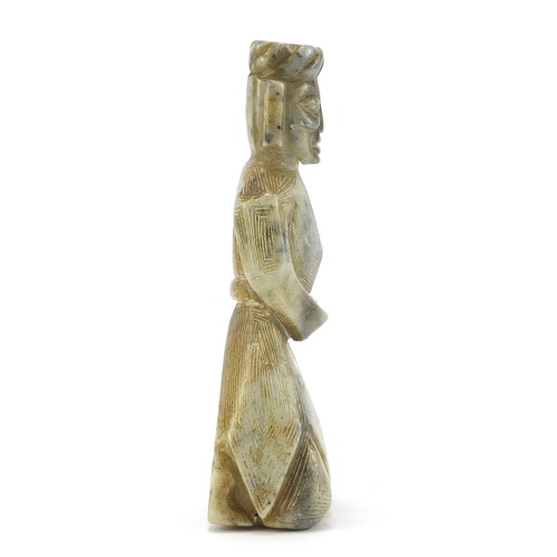 527 - Asian green hardstone carving of an archaic figure kneeling, 19cm high