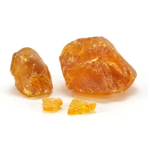 1455 - Four blocks of Baltic amber, the largest 12cm wide, 667.0g