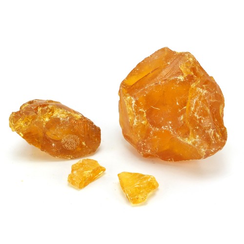 1455 - Four blocks of Baltic amber, the largest 12cm wide, 667.0g