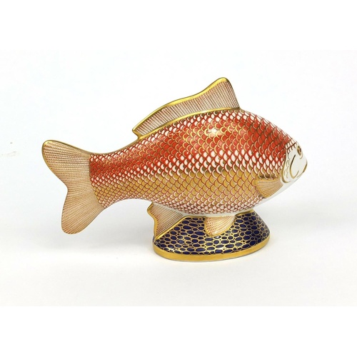 935 - Royal Crown Derby carp paperweight with gold coloured stopper, 11.5cm high