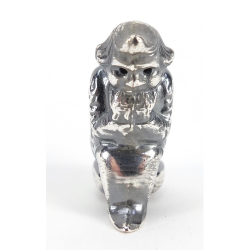 1155 - Novelty silver coloured metal vesta in the form of a leprechaun, 4.5cm high