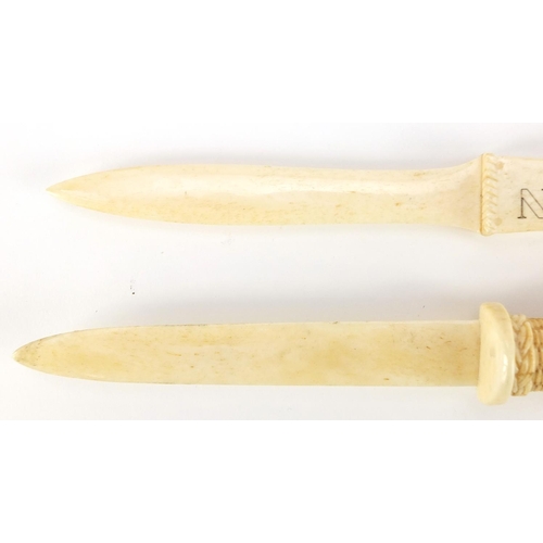 1088 - Two carved bone letter openers including one advertising Paragon Golf Construction, the largest 23cm... 