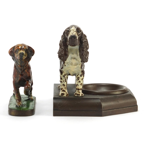 1090 - Painted Spaniel design ashtray and similar paperweight, the largest 17.5cm wide