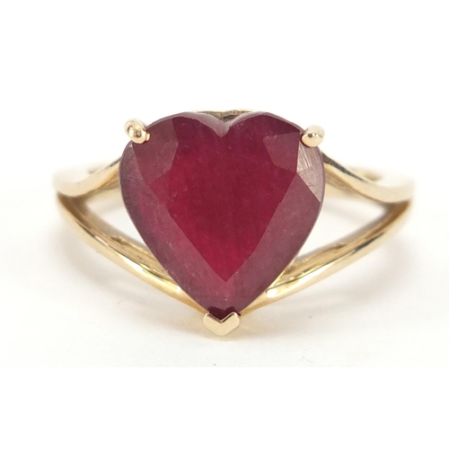 1140 - 9ct gold ruby love heart ring, size N, 3.7g