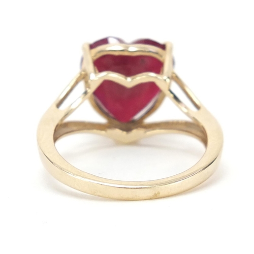 1140 - 9ct gold ruby love heart ring, size N, 3.7g