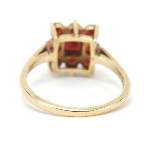 1191 - 9ct gold garnet cluster ring, size P, 3.2g