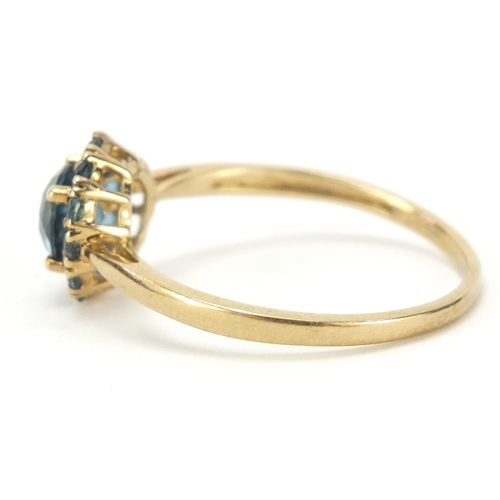 1225 - 9ct gold tanzanite cluster ring, size V, 2.3g