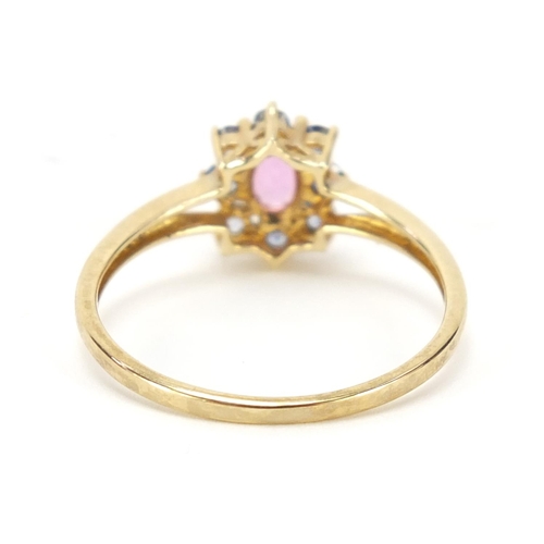 1303 - 9ct gold pink and blue stone cluster ring, size U, 2.2g