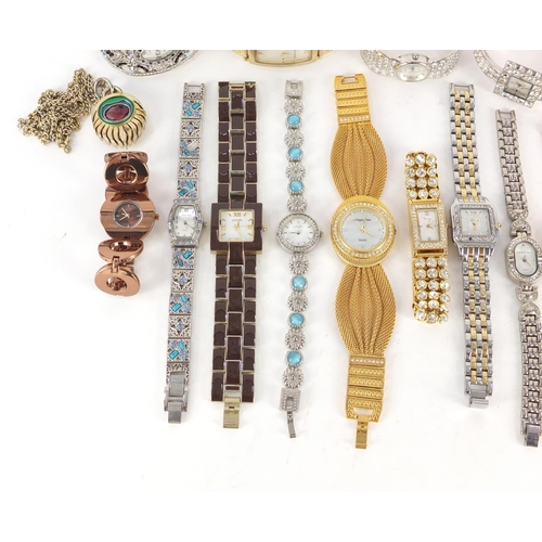 1351 - Ladies wristwatches and fob watches, some with mother of pearl diamonds and some set with colourful ... 