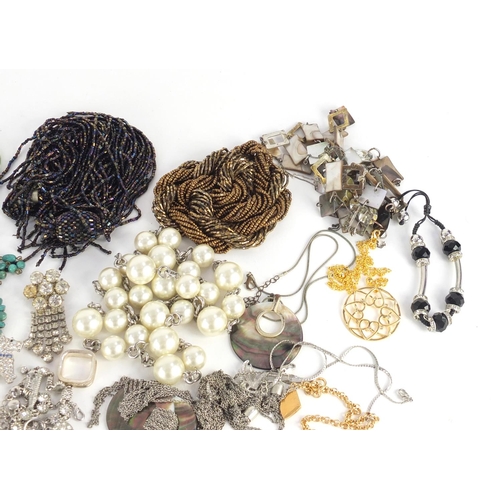 1353 - Costume jewellery including necklaces, bracelets and earrings