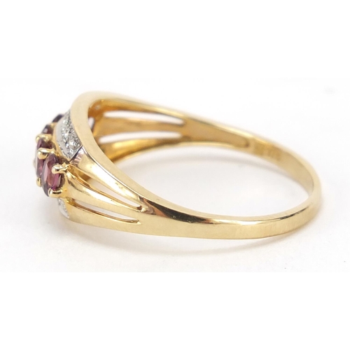 696 - 9ct gold amethyst and diamond three row ring, size V, 2.8g