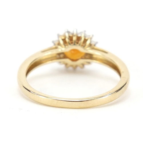 698 - 9ct gold citrine and diamond cluster ring, size P, 2.6g