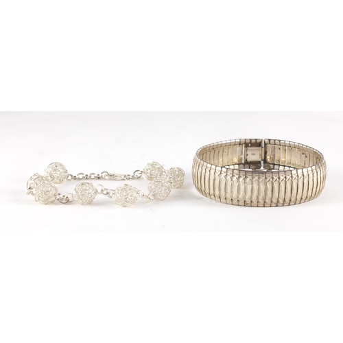 793 - Two silver bracelets including one wire ball design, each 20cm in length, 39.8g