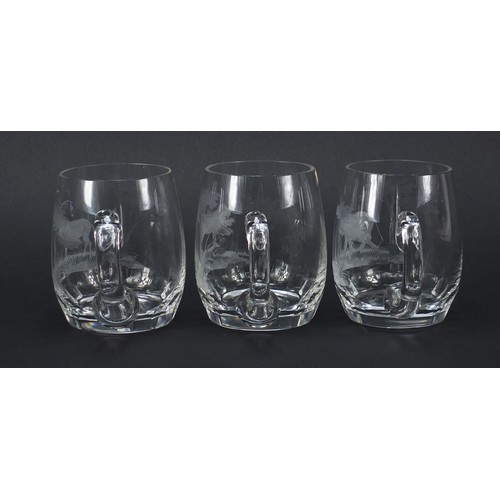 754 - Set of six glass tankards etched with big game by Rowland Ward, each 11.5cm high