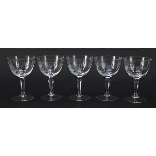 756 - Five wine glasses etched with big game by Rowland Ward, each 14cm high