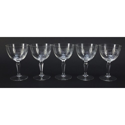 756 - Five wine glasses etched with big game by Rowland Ward, each 14cm high