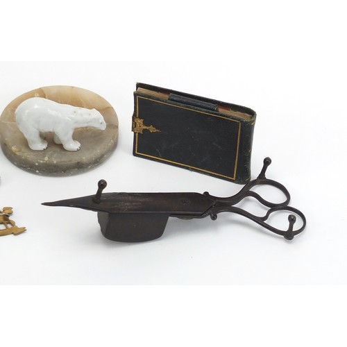 1257 - Objects including a tooled leather notepad, Georgian silver sugar tongs and a carved coquilla nut