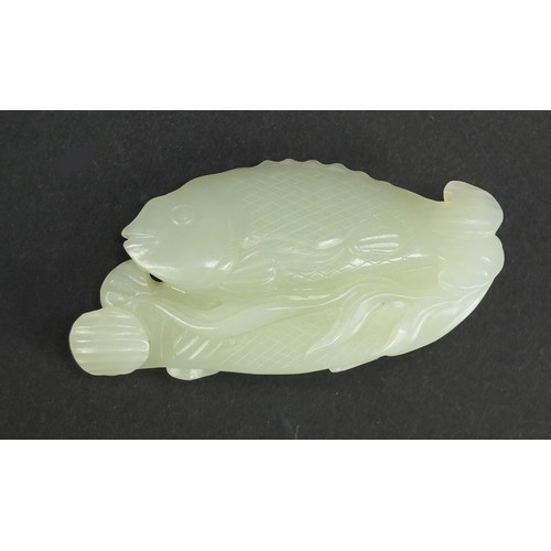 638 - Chinese pale green jade carving of two fish, 7cm wide