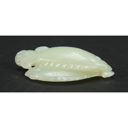 638 - Chinese pale green jade carving of two fish, 7cm wide