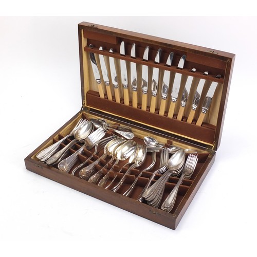 979 - Continental silver plated cutlery housed in a 1920's canteen, 45.5cm wide