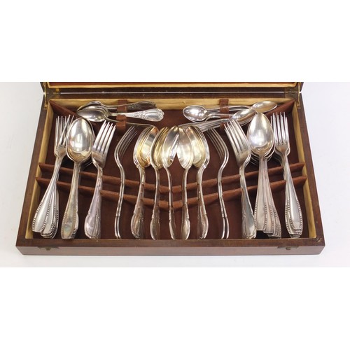 979 - Continental silver plated cutlery housed in a 1920's canteen, 45.5cm wide