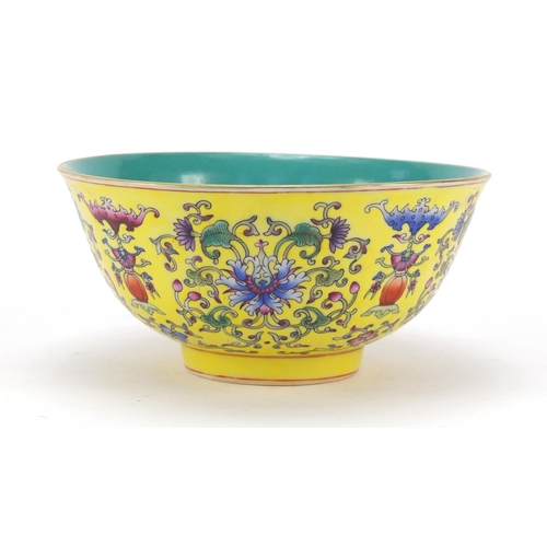 451 - Chinese yellow ground porcelain bowl hand painted in the famille rose palette with blossoming flower... 