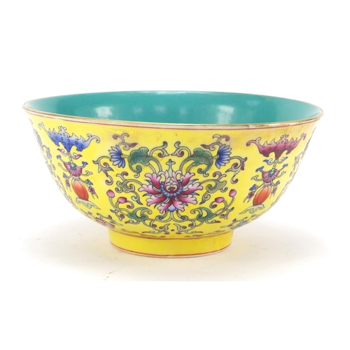 451 - Chinese yellow ground porcelain bowl hand painted in the famille rose palette with blossoming flower... 