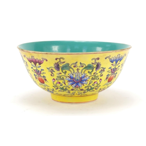 451 - Chinese yellow ground porcelain bowl hand painted in the famille rose palette with blossoming flower... 