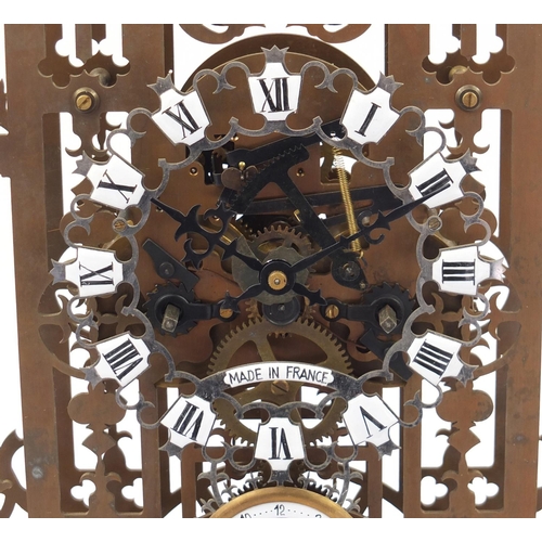 610 - Large French design skeleton clock with moon face and glass case, overall 71cm H x 37cm W x 22cm D