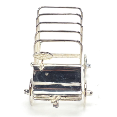 277 - Novelty silver plated toast rack in the form of a car, 16cm in length