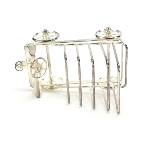 277 - Novelty silver plated toast rack in the form of a car, 16cm in length