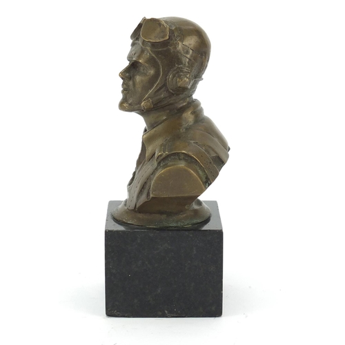 212 - Bronze bust of a World War I Pilot raised on a square black marble base, 13cm high