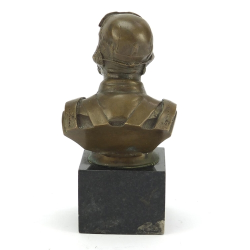 212 - Bronze bust of a World War I Pilot raised on a square black marble base, 13cm high