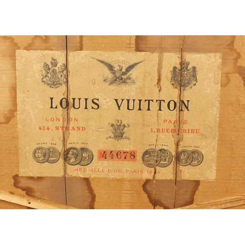 2060 - Early Louis Vuitton wooden and metal bound steamer/travelling trunk with twin handles, paper label t... 