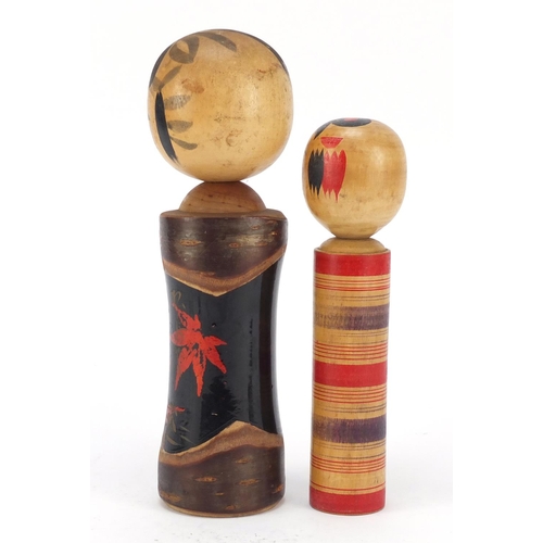 525 - Two Japanese painted wood Kockeshi dolls, the largest 24cm high