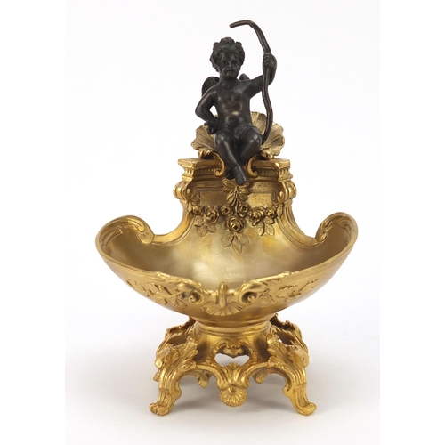 289 - Partially gilt bronze sweetmeat dish in the form of Putti seated on a shell above a bowl, impressed ... 