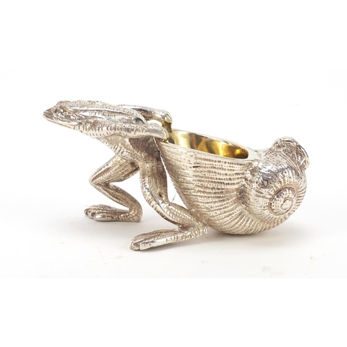 420 - Novelty silver plated salt with gilt interior in the form of a frog pulling a snail shell, 10cm in l... 