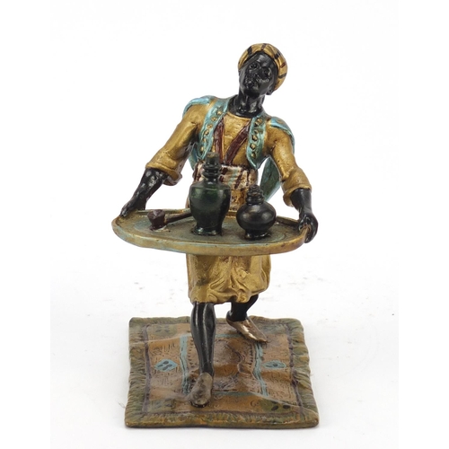 495 - Cold painted bronze of an Arab holding a tray in the style of Franz Xaver Bergmann, 10.5cm high