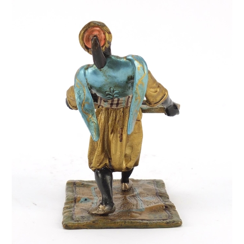 495 - Cold painted bronze of an Arab holding a tray in the style of Franz Xaver Bergmann, 10.5cm high