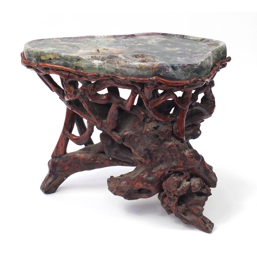 152 - Chinese fluorite specimen tea table raised on a gnarled root base, 57cm H x 74cm W x 50cm D