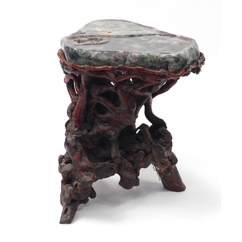 152 - Chinese fluorite specimen tea table raised on a gnarled root base, 57cm H x 74cm W x 50cm D