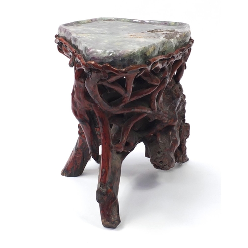 152 - Chinese fluorite specimen tea table raised on a gnarled root base, 57cm H x 74cm W x 50cm D