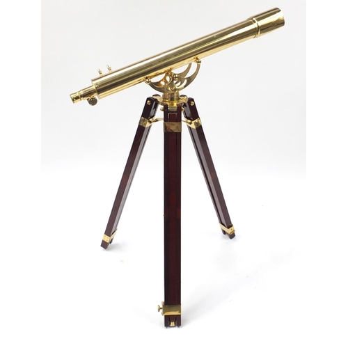 2057 - Floor standing brass telescope with mahogany tripod stand