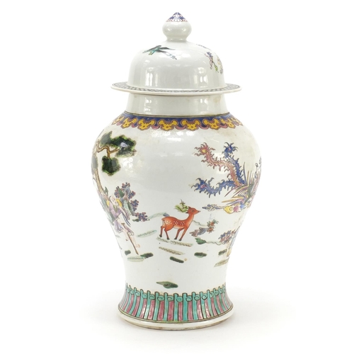 404 - Chinese porcelain baluster vase and cover hand painted in the famille rose palette with Daoist immor... 