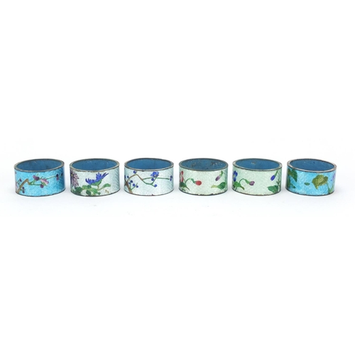 521 - Set of six Japanese cloisonné napkin rings with box, each enamelled with flowers, each 5cm in diamet... 