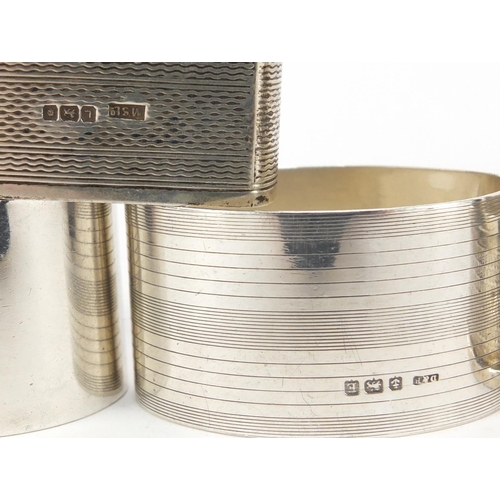 417 - Nine silver napkin rings, various hallmarks, 265g