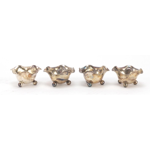 83 - Set of four Victorian silver salts by Fenton Brothers,  housed in a George Edward & Sons velvet and ... 