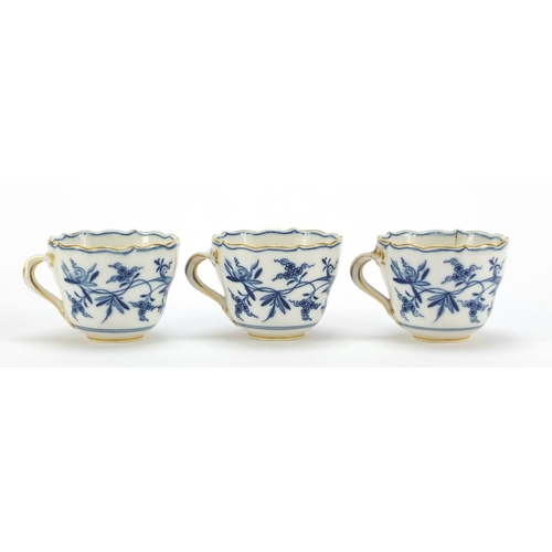 93 - Set of six Meissen fluted cups and saucers, each hand painted in the Blue Onion pattern, crossed swo... 