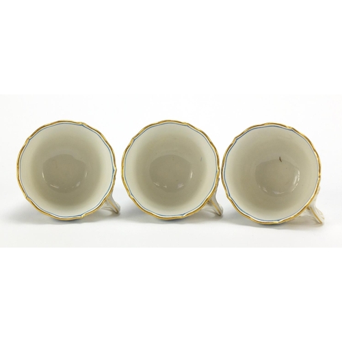 93 - Set of six Meissen fluted cups and saucers, each hand painted in the Blue Onion pattern, crossed swo... 